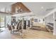 Well-equipped fitness center with modern exercise machines and hardwood flooring at 9 Marsh Island Ln, Isle of Palms, SC 29451