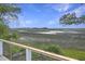 Enjoy stunning marsh views from the home's deck, with lush greenery meeting the serene waters at 9 Marsh Island Ln, Isle of Palms, SC 29451