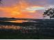Beautiful landscape view of a marsh and a colorful sunset at 9 Marsh Island Ln, Isle of Palms, SC 29451