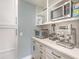 Butler's pantry features countertops, cabinets, shelving, a microwave, and beverage machines at 9 Marsh Island Ln, Isle of Palms, SC 29451