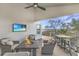 Outdoor patio features comfortable seating around a fire pit and a beautiful waterfront view at 9 Marsh Island Ln, Isle of Palms, SC 29451