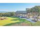 Picturesque pavilion with picnic tables, located near the ocean and lush landscaping at 9 Marsh Island Ln, Isle of Palms, SC 29451