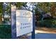 Entrance sign for tennis center at 9 Marsh Island Ln, Isle of Palms, SC 29451