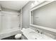 Updated bathroom with a shower-tub combo and marble vanity at 1 Colleton Dr, Charleston, SC 29407