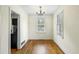 Dining room featuring hardwood floors and bright windows at 1 Colleton Dr, Charleston, SC 29407