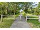 The West Ashley Greenway is a paved trail with trees offering a scenic route for walking and recreation at 1 Colleton Dr, Charleston, SC 29407