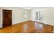 Bright living room with hardwood floors and French doors at 1 Colleton Dr, Charleston, SC 29407