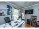 Bright room with hardwood floors, ceiling fan, and natural light, perfect for a home office or bedroom at 100 Nighthawk Ln, Summerville, SC 29485