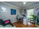 Bright room with hardwood floors, ceiling fan, and natural light, perfect for a home office or bedroom at 100 Nighthawk Ln, Summerville, SC 29485