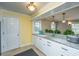 Kitchen area featuring white cabinets with granite countertops at 100 Nighthawk Ln, Summerville, SC 29485