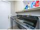 Functional laundry room with modern washer and dryer, plus ample storage space at 100 Nighthawk Ln, Summerville, SC 29485