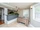 Open office area with tile flooring and a view of the kitchen at 100 Nighthawk Ln, Summerville, SC 29485