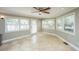 Inviting sunroom with neutral walls, many windows, and tile floors at 100 Nighthawk Ln, Summerville, SC 29485