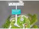 Overhead view of boat dock, gazebo, river access, fire pit and landscaping at 100 Tidewater Way, Charleston, SC 29492
