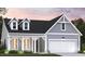 Charming single-Gathering home featuring gray siding, dormer windows, and a two-car garage at 1000 Winding Grove Ln, Moncks Corner, SC 29461