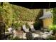 Secluded backyard with lounge seating and lush greenery at 1012 Ashley Ave, Charleston, SC 29403