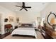 Bedroom featuring a plush bed, neutral decor, and dark hardwood floors at 1012 Ashley Ave, Charleston, SC 29403