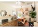 Bright bedroom featuring eclectic decor, wooden dresser, and natural lighting at 1012 Ashley Ave, Charleston, SC 29403