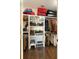 Spacious walk-in closet with built-in shelving for organized storage and hanging clothes at 1012 Ashley Ave, Charleston, SC 29403