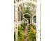 Secluded courtyard features lush greenery and covered lounge area at 1012 Ashley Ave, Charleston, SC 29403