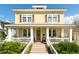Charming two-story home with inviting front porch, manicured landscaping, and classic architectural details at 1012 Ashley Ave, Charleston, SC 29403