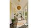Cozy front porch with classic seating, a modern ceiling fan and natural wood decking at 1012 Ashley Ave, Charleston, SC 29403