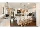 Bright kitchen with an island, white cabinets, stone accent wall, and stainless-steel appliances at 1012 Ashley Ave, Charleston, SC 29403