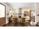 Elegant living room featuring a fireplace, bookshelves, stylish furnishings and hardwood floors at 1012 Ashley Ave, Charleston, SC 29403