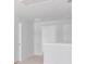 Bright hallway featuring neutral walls and white trim, connecting various rooms and creating an open and airy atmosphere at 1064 Forrest Creek Dr, Summerville, SC 29483