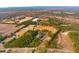 Breathtaking aerial view of the property with a winding river, mature trees, and open land at 1068 Witherbee Rd, Moncks Corner, SC 29461