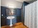 Bathroom with pedestal sink and walk-in shower at 1068 Witherbee Rd, Moncks Corner, SC 29461