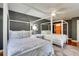 Bedroom features two canopy beds with floral bedding and gray walls at 1068 Witherbee Rd, Moncks Corner, SC 29461