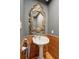 Charming powder room with pedestal sink and decorative mirror at 1068 Witherbee Rd, Moncks Corner, SC 29461