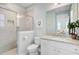 Modern bathroom featuring a glass shower, white cabinets, granite countertops and an abundance of light at 1160 Old Field Dr, Summerville, SC 29483