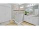 Bright bathroom with a glass shower, white cabinets, granite countertops and decor at 1160 Old Field Dr, Summerville, SC 29483