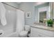 Bathroom featuring a shower-tub combo, granite vanity, and neutral wall color at 1160 Old Field Dr, Summerville, SC 29483