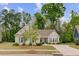 Charming single-story home with a well-manicured lawn and inviting curb appeal, enhanced by blue shutters at 1160 Old Field Dr, Summerville, SC 29483