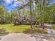 Attractive brick home surrounded by mature trees and a lush lawn, offering curb appeal at 118 Elery Ter, Summerville, SC 29485