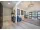 Open-concept living space with ample natural light, wood floors, and stylish decor at 118 Elery Ter, Summerville, SC 29485