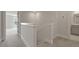 Hallway featuring neutral carpet, white trim, staircase, and access to various rooms at 118 Lilac Grove Way, Summerville, SC 29486