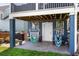 Outdoor patio featuring hanging hammock chairs and ample seating at 1188 Quick Rabbit Loop, Charleston, SC 29414