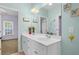 Bright bathroom featuring a double vanity, white countertops, and a neutral-colored floor at 1188 Quick Rabbit Loop, Charleston, SC 29414