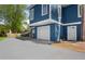 Exterior of the house with a driveway and a single-car garage in blue color at 1188 Quick Rabbit Loop, Charleston, SC 29414