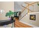 Bright foyer with hardwood floors and stairs leading to the upper level at 1188 Quick Rabbit Loop, Charleston, SC 29414