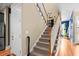 Beautiful staircase with wood and carpet detail leading to the second story at 1188 Quick Rabbit Loop, Charleston, SC 29414
