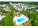 Aerial view of a large pool surrounded by homes and trees at 1243 Appling Dr, Mount Pleasant, SC 29464
