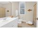 Clean bathroom with a white vanity, commode and decorative fish at 1243 Appling Dr, Mount Pleasant, SC 29464