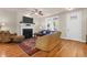 Bright living room with hardwood floors, a fireplace, and neutral decor at 1243 Appling Dr, Mount Pleasant, SC 29464