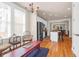 Bright living room with hardwood floors, modern kitchen access, and natural light at 1243 Appling Dr, Mount Pleasant, SC 29464