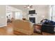 Spacious living room with hardwood floors, fireplace, and an open concept layout at 1243 Appling Dr, Mount Pleasant, SC 29464